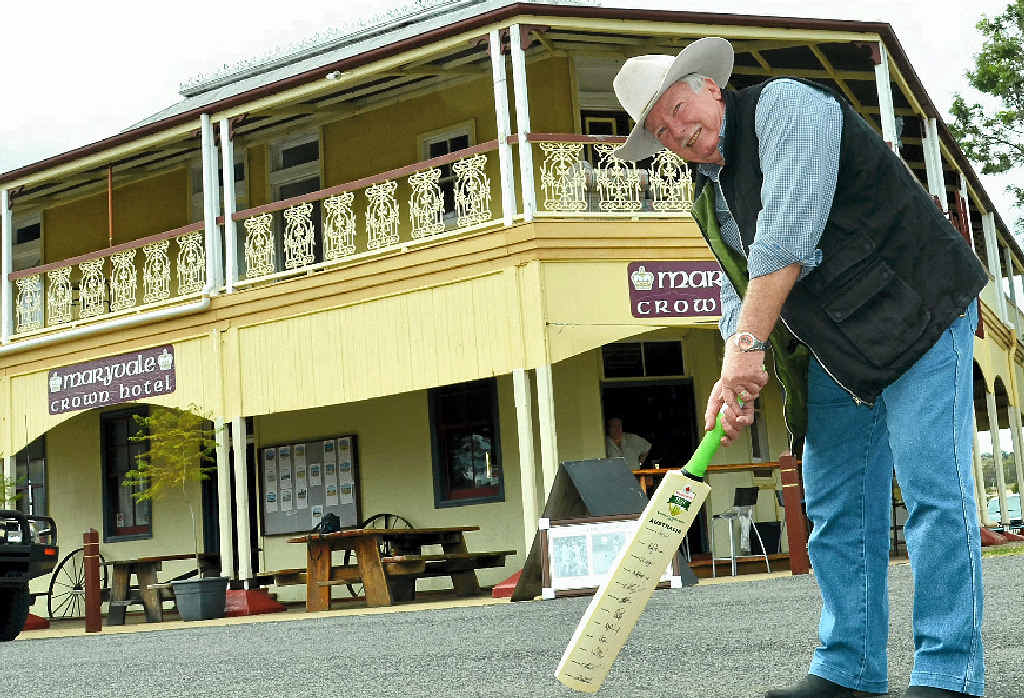 BATTING FOR A BETTER LIFE: Maryvale resident Ray Vincent tries out the bat signed by the 2012 Australian Cricket team, up for auction at the fundraiser next Saturday.